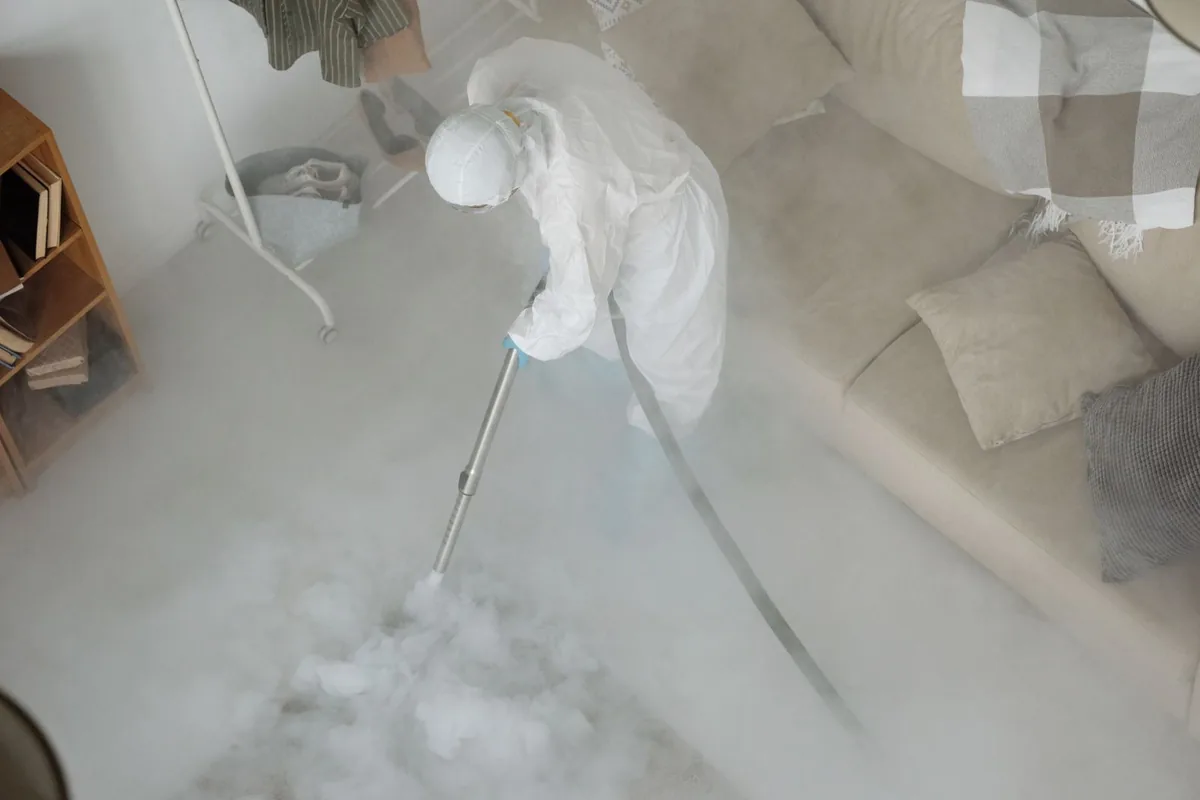 Biohazard cleanup technician in protective equipment, Sunnyslope, WA